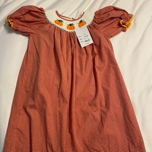 Mom & Me smocked pumpkin dress in maroon and orange